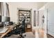 Functional home office with a spacious desk, ample storage, and natural light at 149 Jewel St, Brighton, CO 80603