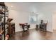 Bright, well-lit room with hardwood floors featuring a vintage sewing machine at 149 Jewel St, Brighton, CO 80603