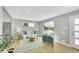 Bright living room with hardwood floors, natural light, and stylish decor at 7634 Navajo St, Denver, CO 80221