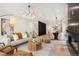 Beautiful open-concept living space featuring contemporary design elements and natural light throughout at 3049 S Cherokee St, Englewood, CO 80110
