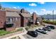 The building's exterior is clean and well-maintained, featuring parking and well kept landscaping at 311 W Lehow Ave # 3, Englewood, CO 80110