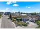 Street view of commercial building showcasing landscaping, parking, and city charm at 311 W Lehow Ave # 3, Englewood, CO 80110