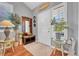 Inviting foyer with hardwood floors, coat rack, and natural light at 19771 E Wesley Pl, Aurora, CO 80013