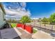 Outdoor patio space with red planters and neighborhood views at 19771 E Wesley Pl, Aurora, CO 80013