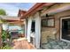 Relaxing patio setup with grill, furniture, and partial covering at 1255 S Dillon Way, Aurora, CO 80012