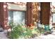 Charming home exterior with beautiful flowers and well-maintained landscaping at 1255 S Dillon Way, Aurora, CO 80012