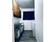 Laundry area with ample storage and workspace, next to washer and dryer appliances at 1255 S Dillon Way, Aurora, CO 80012