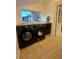 Convenient laundry room featuring modern appliances, a wooden countertop, and natural light at 2204 S Acoma St, Denver, CO 80223