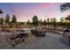 Backyard patio with a hot tub, dining area, and water feature is perfect for outdoor entertaining at 6001 Powell Rds, Parker, CO 80134