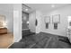 Modern bathroom showcasing a glass-enclosed shower with stylish tile work, and sleek fixtures at 6001 Powell Rds, Parker, CO 80134