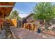 Backyard patio with a custom grilling station and outdoor cooking space at 1313 Garden Cir, Longmont, CO 80501