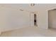 A finished basement boasts neutral carpeting and trim at 1313 Garden Cir, Longmont, CO 80501