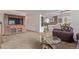 Open-concept layout showcases the spacious living room and adjacent dining area at 1313 Garden Cir, Longmont, CO 80501
