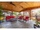 A covered patio with lounge seating, ceiling fans, and shade at 1313 Garden Cir, Longmont, CO 80501