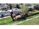The backyard has a shed, a fire pit, mature trees, and a privacy fence at 4845 S Taft St, Morrison, CO 80465