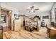 Bedroom featuring wood floors, a rustic bed frame, wood closet and dresser at 4845 S Taft St, Morrison, CO 80465