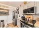 Modern kitchen with stainless steel appliances, stylish countertops, and ample cabinet space at 4845 S Taft St, Morrison, CO 80465