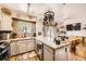 Well-designed kitchen featuring a kitchen island, modern appliances, and ample countertop space at 4845 S Taft St, Morrison, CO 80465