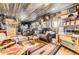 Fun living room area featuring bar, vintage jukebox and eclectic decor at 4845 S Taft St, Morrison, CO 80465