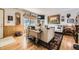 Bright living room featuring wood accents, comfortable seating, and a large window at 4845 S Taft St, Morrison, CO 80465