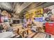 Fun living room area featuring a stone fireplace, vintage decor and a colorful area rug at 4845 S Taft St, Morrison, CO 80465