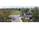 Street aerial shot with grassy fields and mature trees surrounding the neighborhood at 4845 S Taft St, Morrison, CO 80465