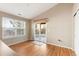 A bedroom featuring wood floors, and a sliding glass door leading to the backyard at 464 N Jamestown Way, Aurora, CO 80018