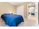 Cozy bedroom with neutral walls, carpet, closet, and easy access to the rest of the house at 464 N Jamestown Way, Aurora, CO 80018