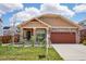 Charming single-Gathering home with manicured lawn, stone accents, and a two-car garage at 464 N Jamestown Way, Aurora, CO 80018