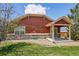 Well maintained home exterior featuring manicured lawn and covered patio at 464 N Jamestown Way, Aurora, CO 80018