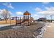 Community playground featuring a slide, monkey bars, and covered play structure for neighborhood children at 464 N Jamestown Way, Aurora, CO 80018