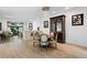 Cozy living room featuring stylish seating, decorative mirror and outdoor view at 210 N Garfield St, Denver, CO 80206