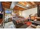 Finished basement with carpet, exposed beams, and a bedroom at 2991 W 81St Ave # G, Westminster, CO 80031