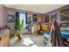 The bedroom has wood trim, light purple walls, and carpet at 2991 W 81St Ave # G, Westminster, CO 80031