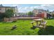 A grassy area with picnic table near the community pool at 2991 W 81St Ave # G, Westminster, CO 80031