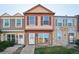 Charming townhome with a stone facade, complemented by colorful accents and a well-maintained lawn at 2991 W 81St Ave # G, Westminster, CO 80031