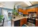 Open kitchen with ample counter space and a sliding door to the outdoor patio at 2991 W 81St Ave # G, Westminster, CO 80031