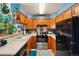 Functional kitchen with oak cabinetry, stainless steel appliances, and ample counter space at 2991 W 81St Ave # G, Westminster, CO 80031