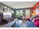 Inviting living room with stylish decor, a large window, and comfortable furniture at 2991 W 81St Ave # G, Westminster, CO 80031