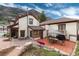 Backyard showing a spacious deck for outdoor dining with mountain views at 200 Rose St, Georgetown, CO 80444