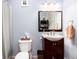 Cozy bathroom with classic fixtures, cabinet storage, and neutral decor at 200 Rose St, Georgetown, CO 80444