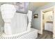 A bath area features a claw foot tub with shower and an adjoining bathroom at 200 Rose St, Georgetown, CO 80444