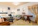 Charming bedroom features two twin beds, vintage furniture, striped wallpaper, and natural light at 200 Rose St, Georgetown, CO 80444