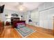 Spacious bedroom features hardwood floors, storage, and a large window bench at 200 Rose St, Georgetown, CO 80444