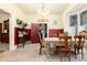 Charming dining room with vintage decor, lace tablecloth, and natural light at 200 Rose St, Georgetown, CO 80444