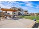 Backyard with patio area, pergola, and seating offering relaxation and outdoor enjoyment at 42363 Glen Abbey Dr, Elizabeth, CO 80107