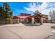 Exterior shot of building with portico at 42363 Glen Abbey Dr, Elizabeth, CO 80107