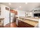 Beautiful kitchen features stainless steel appliances, granite countertops, and warm wood cabinetry for a stylish and functional space at 42363 Glen Abbey Dr, Elizabeth, CO 80107