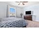 Tranquil primary bedroom showcasing a spacious layout, soft carpet, and serene natural light at 42363 Glen Abbey Dr, Elizabeth, CO 80107