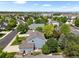 Two-story home with a backyard, showcasing the property's layout and location within the community at 17395 E Dewberry Dr, Parker, CO 80134